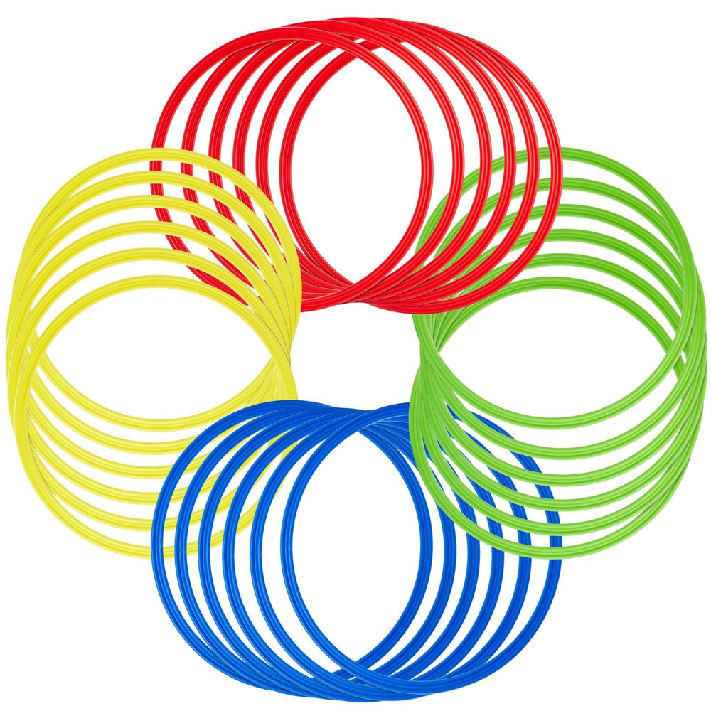 Juvale agility rings next to ruler showing 15.75-inch diameter scale
