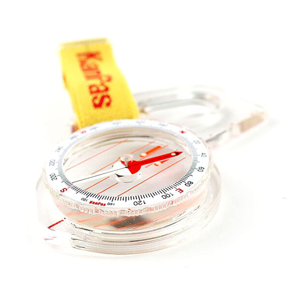 KanPas compass in stream demonstrating waterproof durability and reliability
