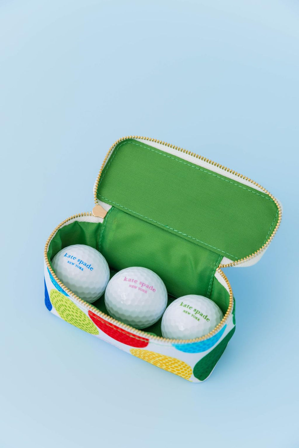 kate spade new york size comparison next to tape measure, compact profile benefit