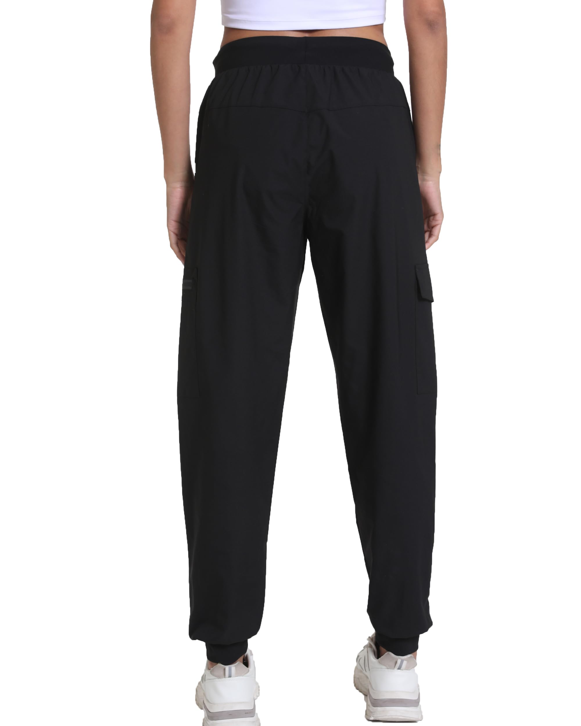 Kcutteyg pants next to a size ruler to show scale and true-to-size fit guidance