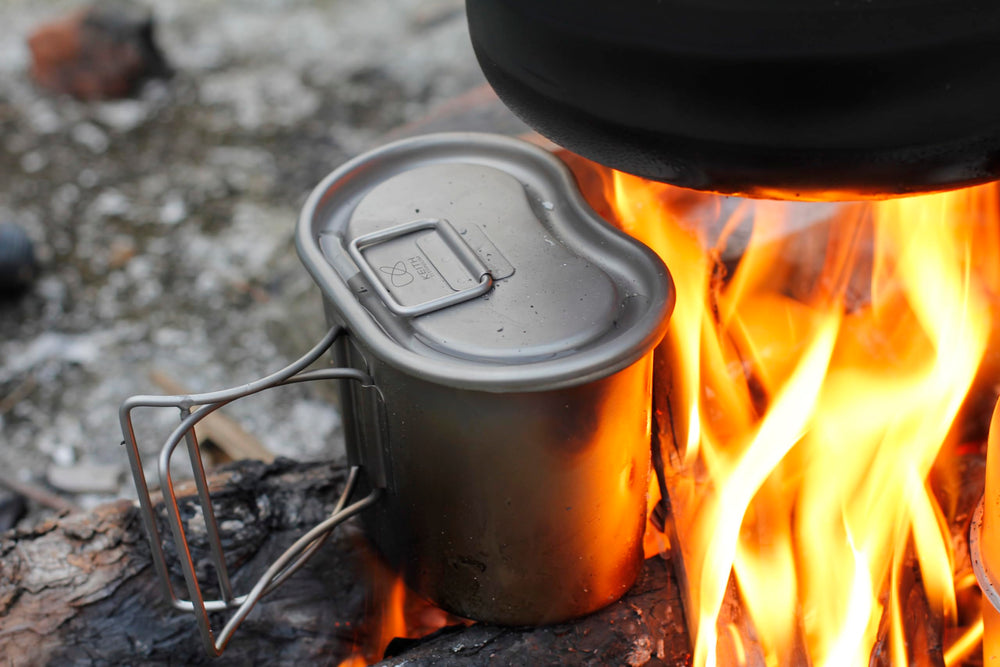 Keith Ti3060 boiling water over camp stove, quick heating efficiency