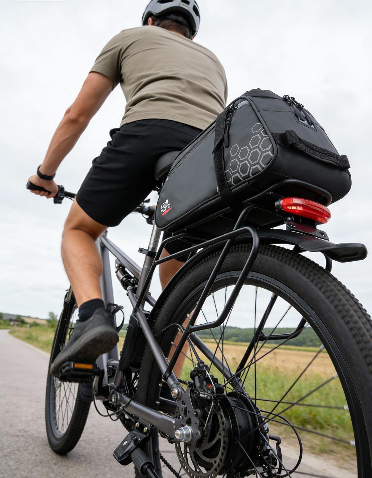 KEMIMOTO shoulder carry use in a lifestyle scene for convenient transport off-bike