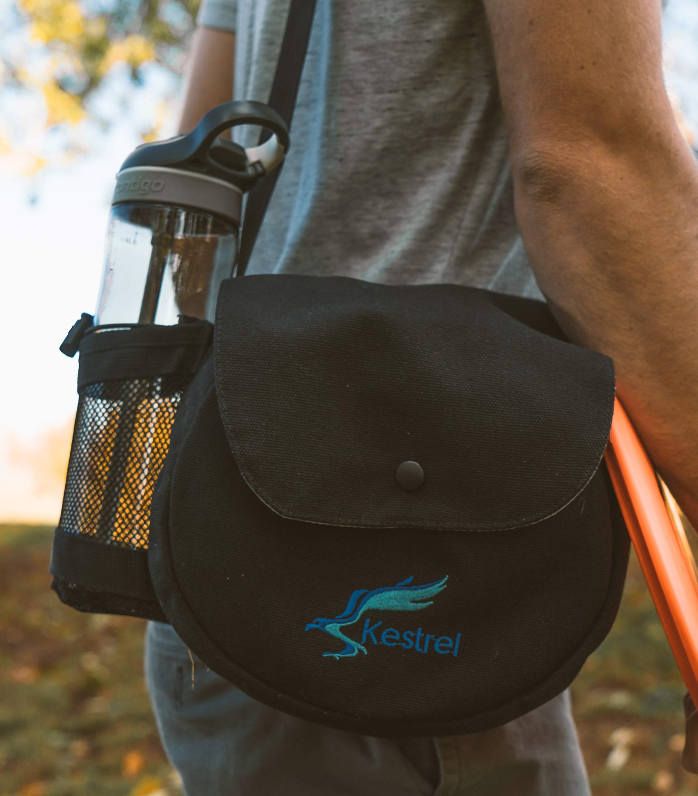 Kestrel size comparison in hand showing disc scale for comfortable grip