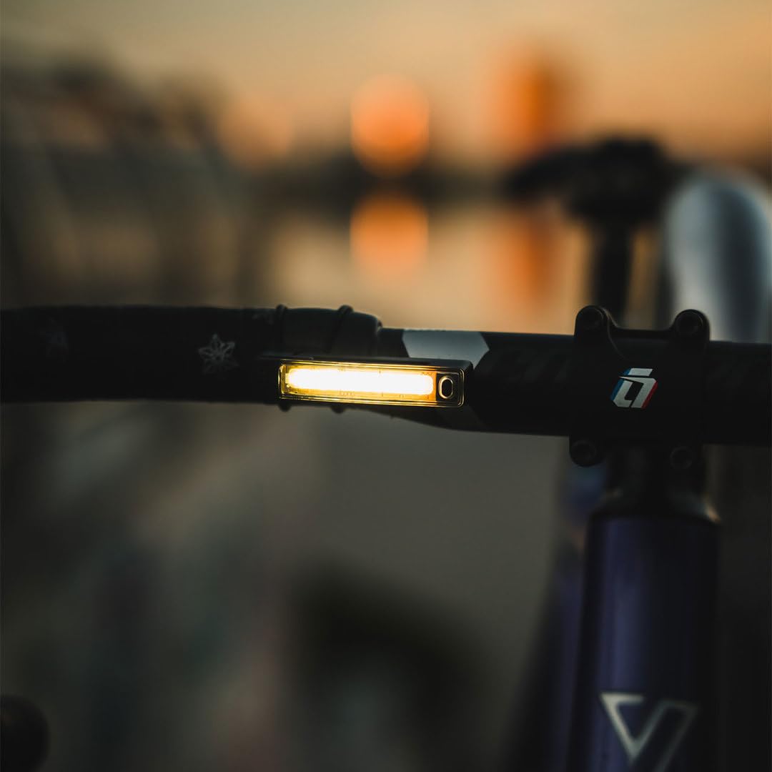 KNOG Plus illuminated in rain demonstrating KNOG weatherproof reliability