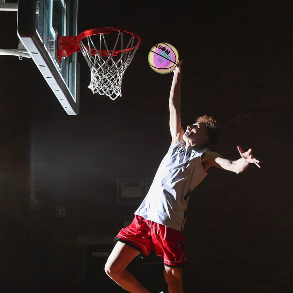 KPASON basketball in hand illustrating size comparison and easy handling benefit