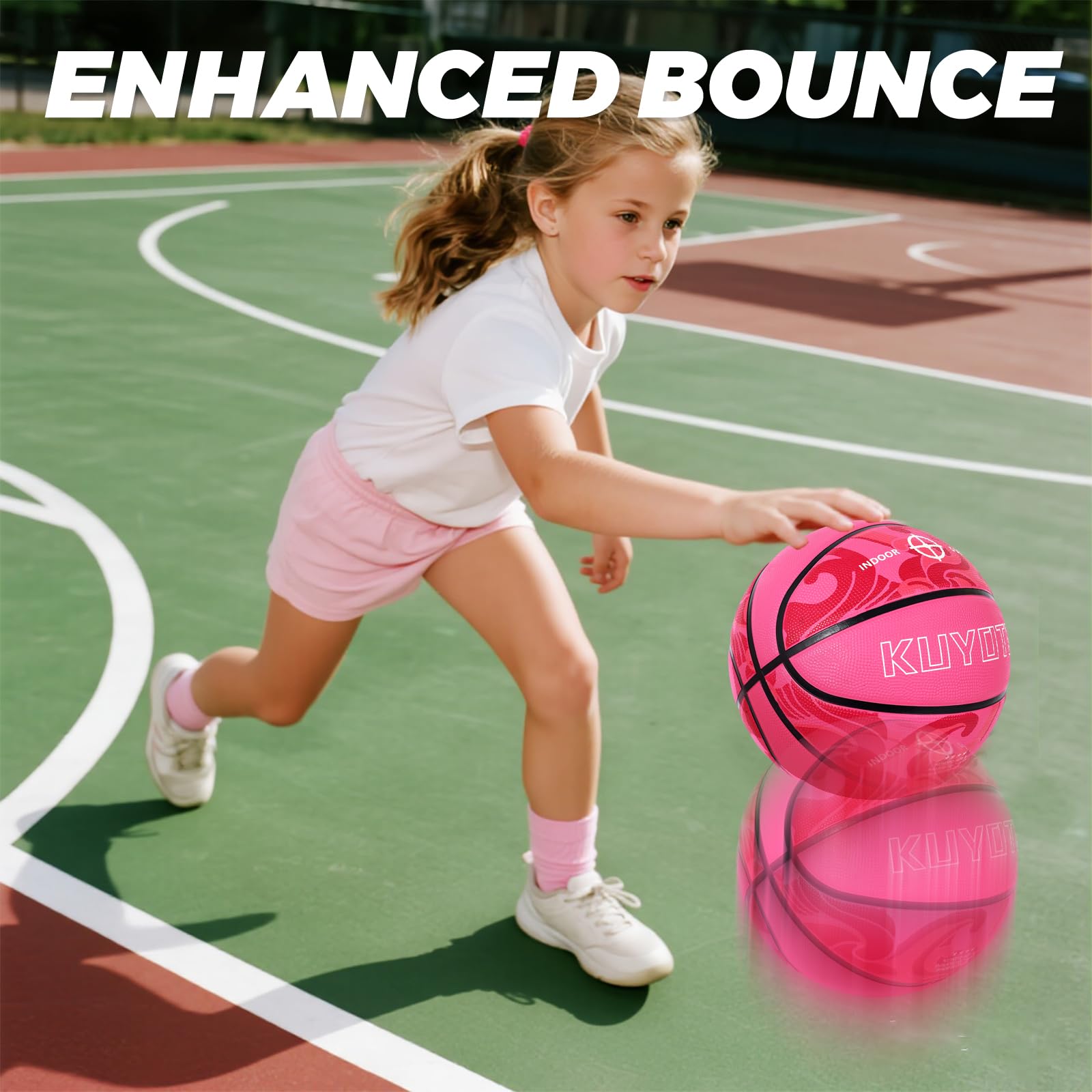 KUYOTQ child holding basketball showing comfortable size for youth hands