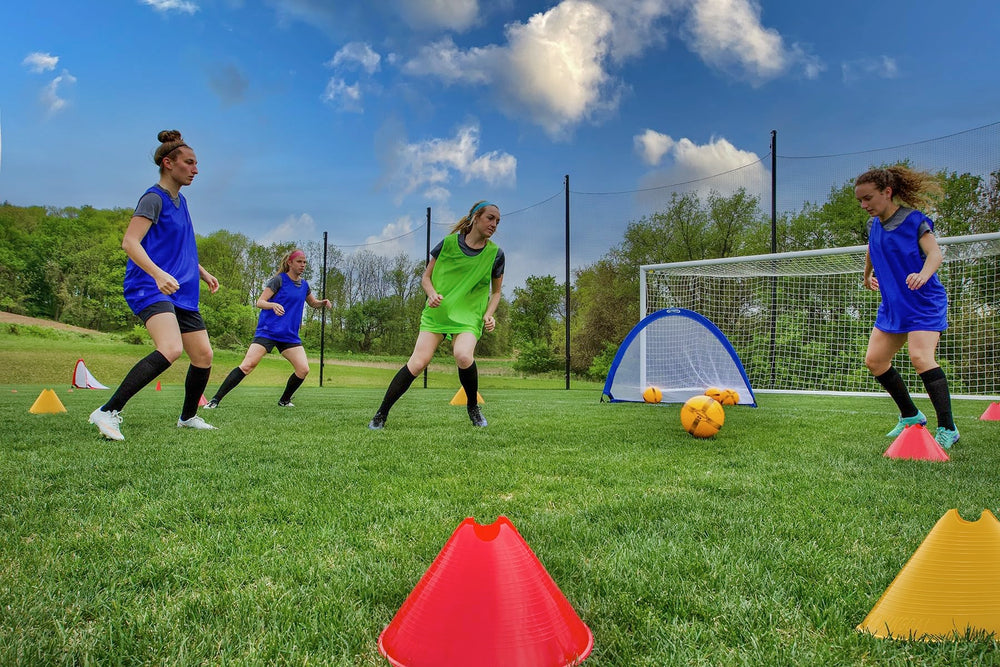 Kwik Goal cones arranged for agility drill on turf showing clear field definition