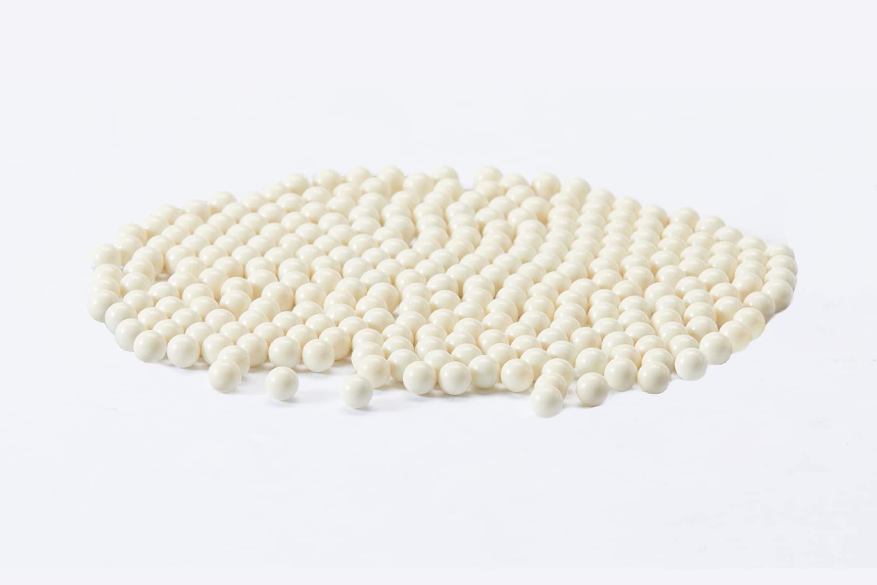 Lancer Tactical close-up of polished seamless 6mm BBs highlighting smooth finish and accuracy