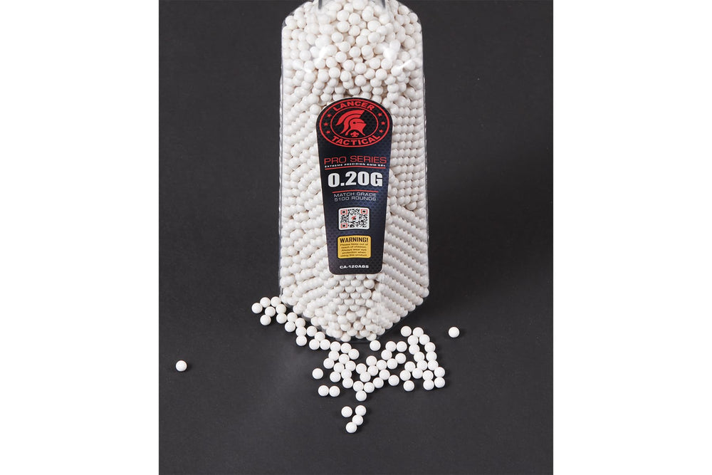 Lancer Tactical BBs beside a ruler showing scale and 0.25g weight clarity