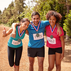 Landical medal held in hand showing scale and comfortable weight