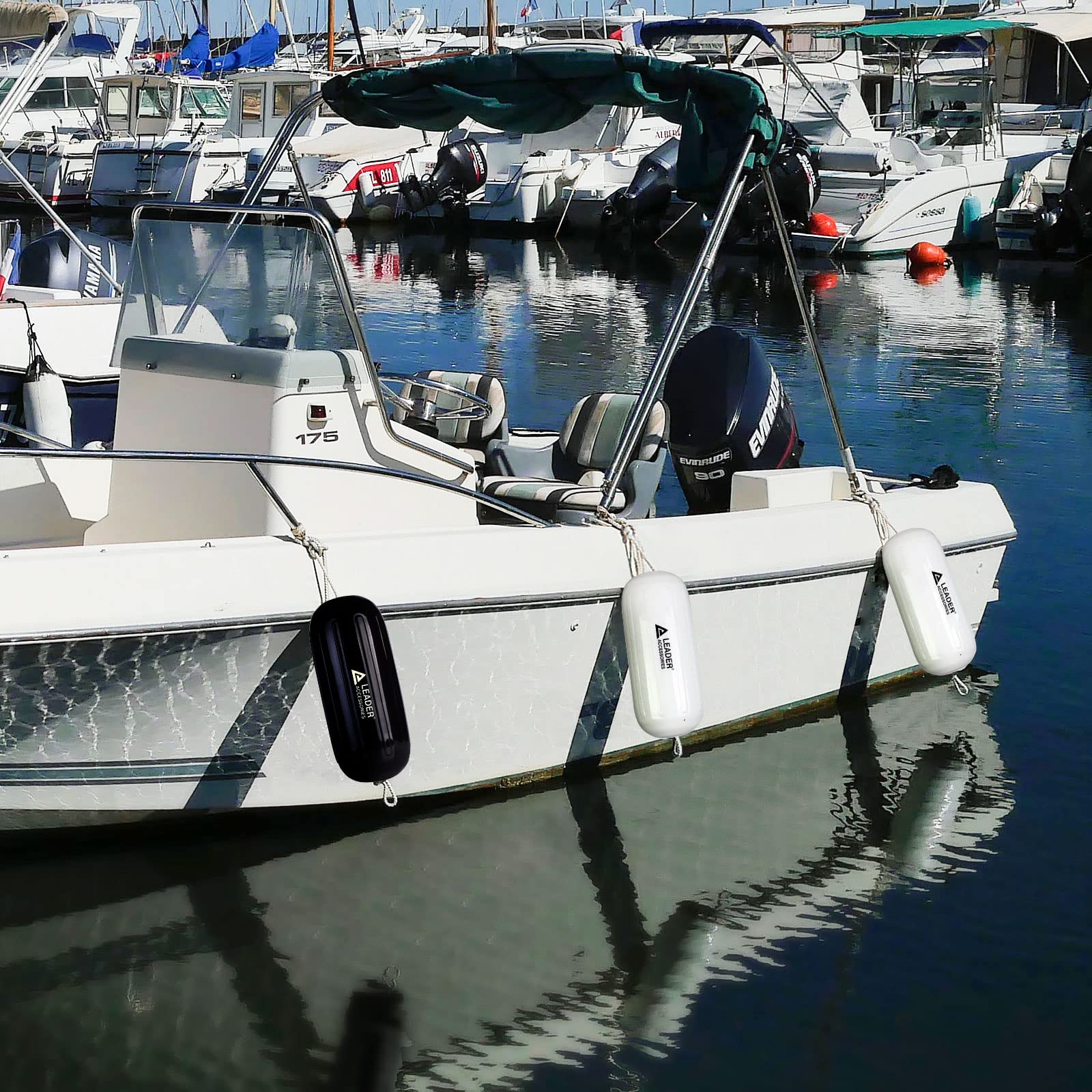 Leader Accessories installed on boat at dock providing hull protection