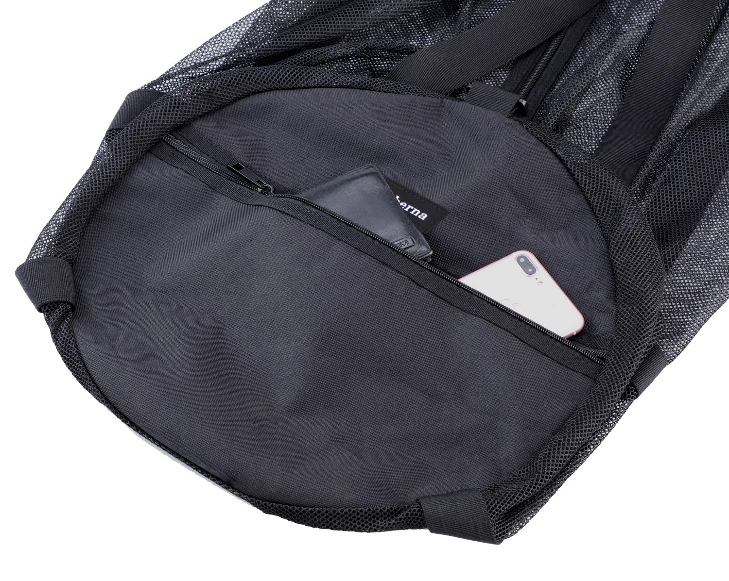 Leberna duffle on beach in lifestyle scene showing easy sand drainage and convenience