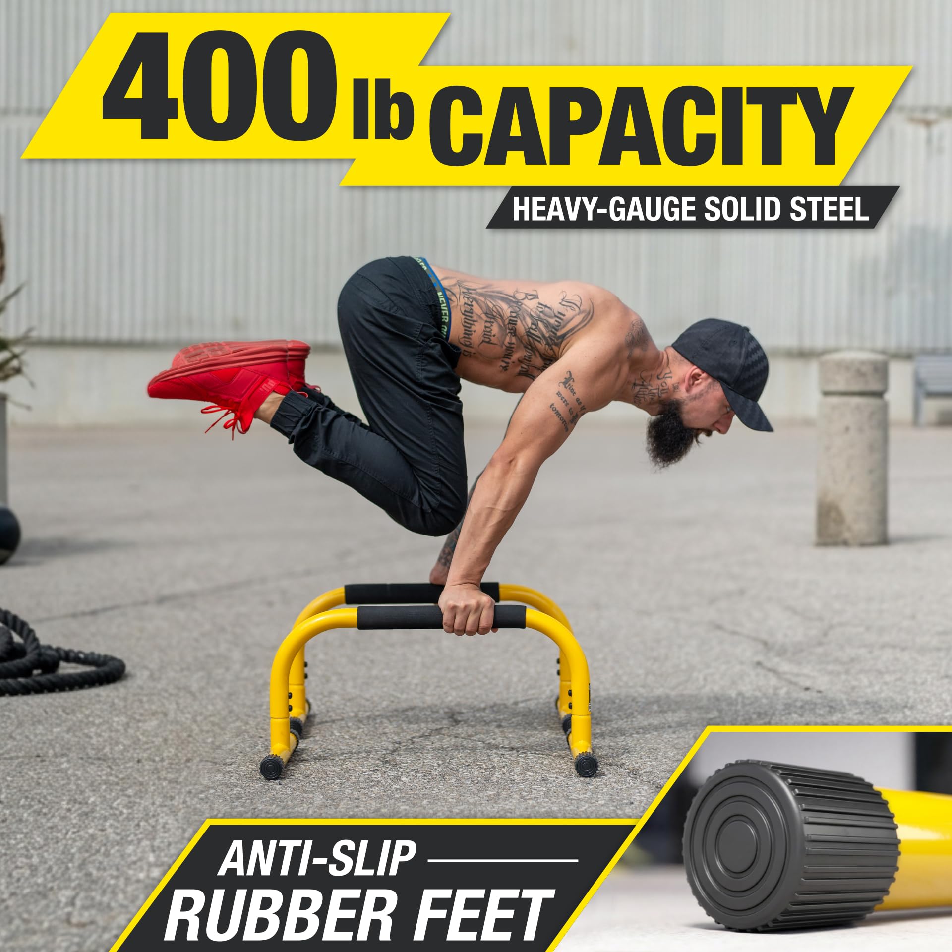 Lebert Fitness parallettes beside a water bottle to illustrate compact size and portability