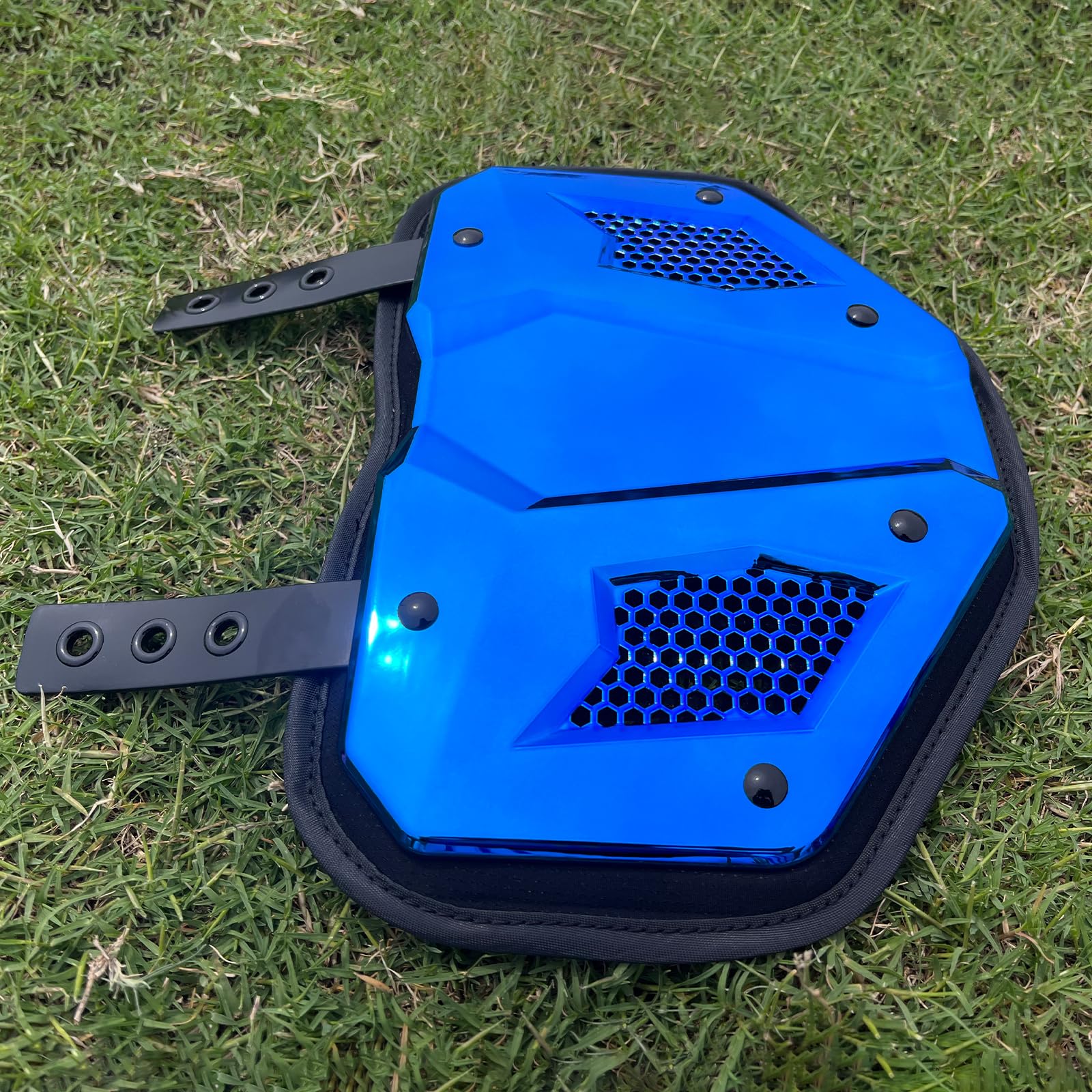 LeCool player wearing chrome blue back plate in game setting showing confident field performance