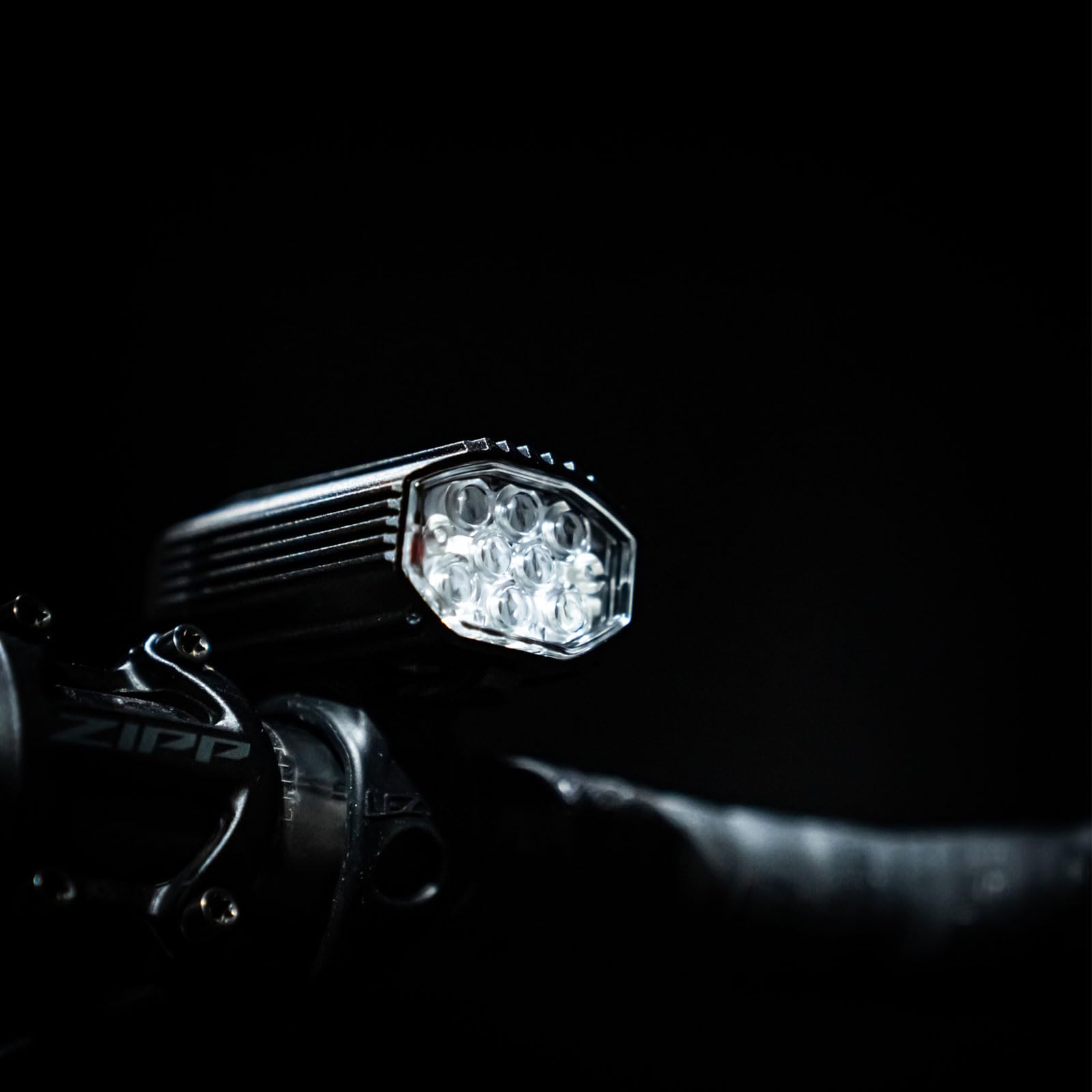 LEZYNE mounted on bike at night showing clear trail visibility for safety