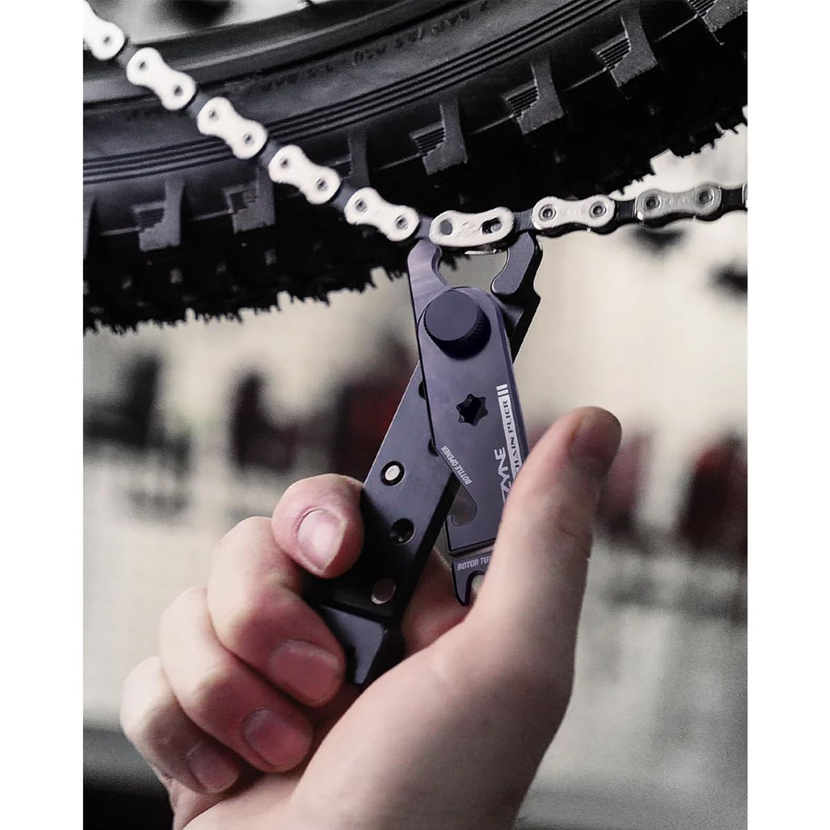 LEZYNE rotor aligner in use straightening disc rotor for reduced brake rub benefit