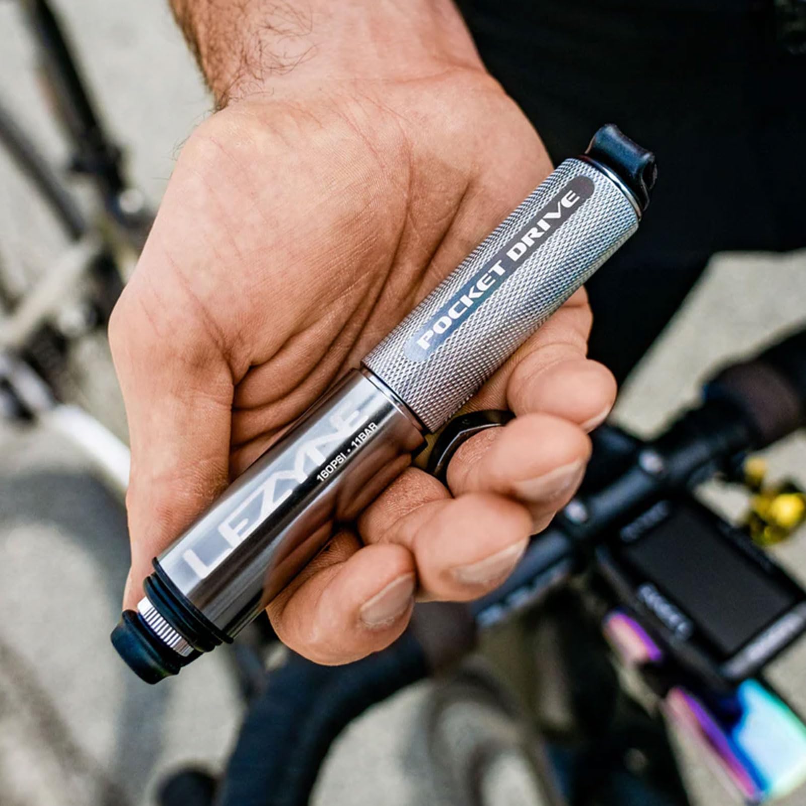 LEZYNE Pocket Drive HP next to marker pen size comparison highlighting pocket-friendly portability