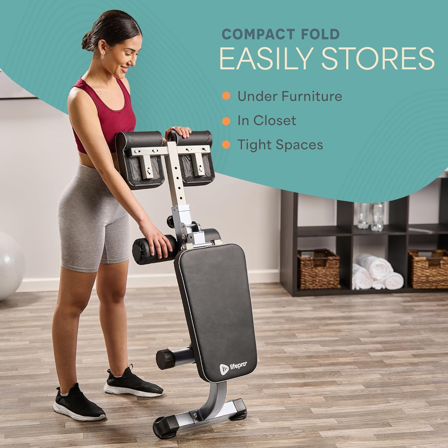 LifePro SculptTrainer next to dumbbell showing compact footprint and scale