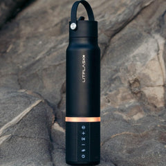 LitFlask beside smartphone showing size and 5000 mAh charging convenience