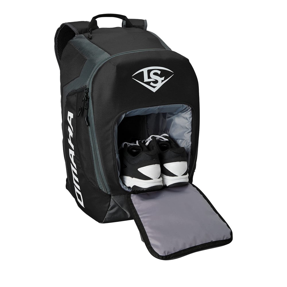 Louisville Slugger bag next to helmet showing youth-size scale