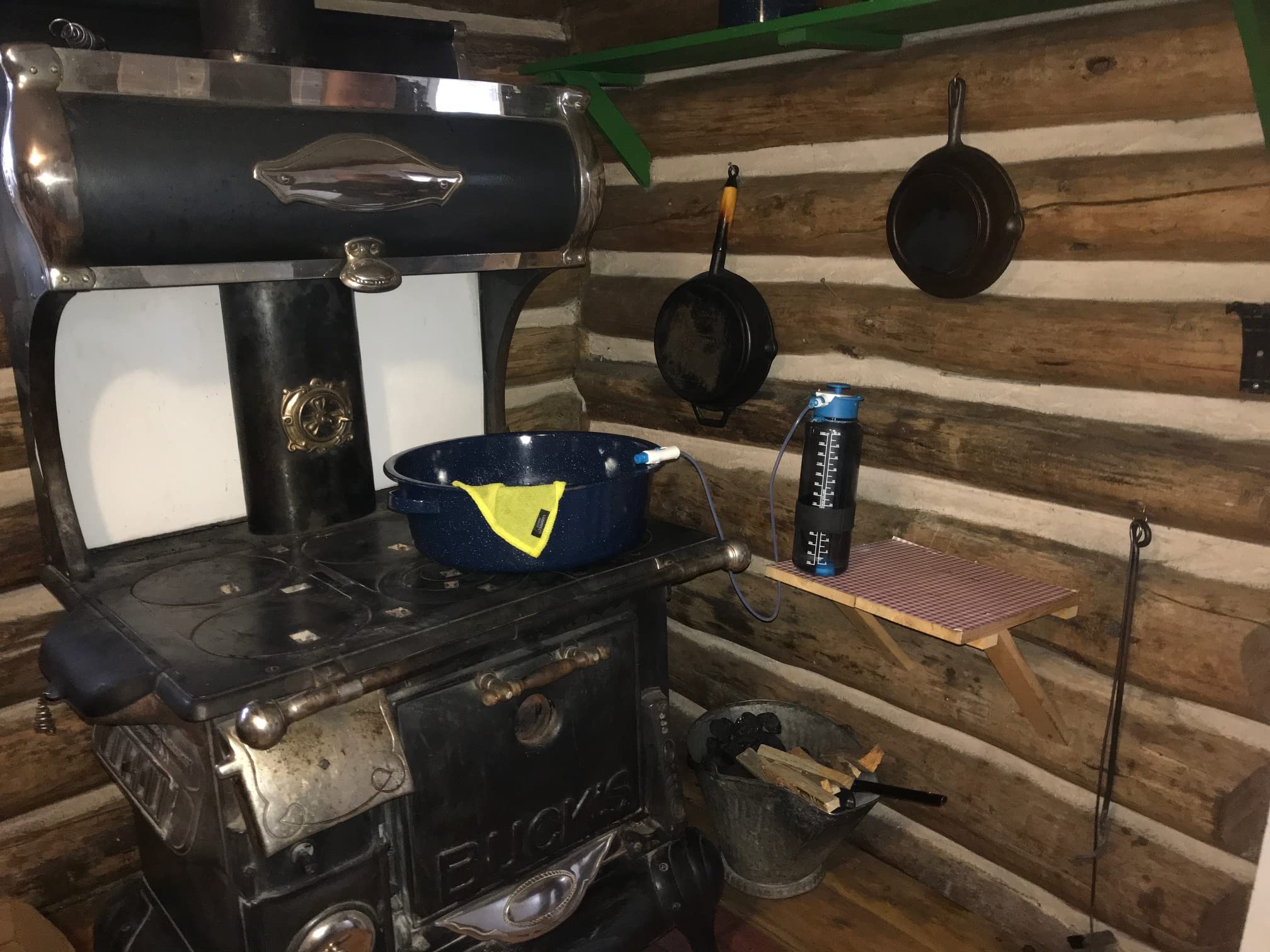 Lunatec on a campsite table showing portable hot and cold water benefits