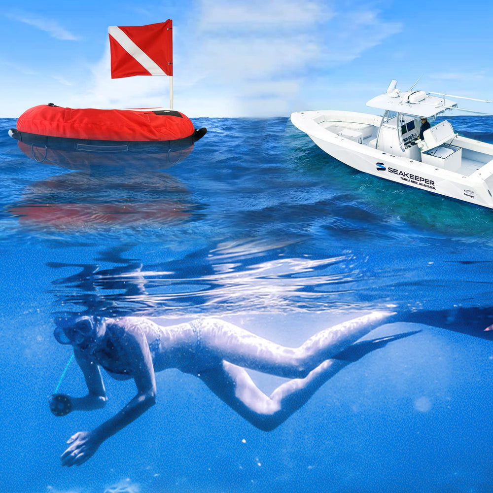 Luwint buoy held by hands showing 29-inch scale and travel-friendly size