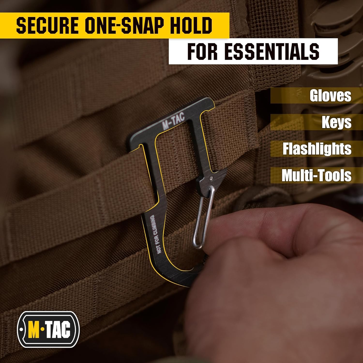 M-Tac carabiner clipped to molle strap showing easy attachment and fast access benefit