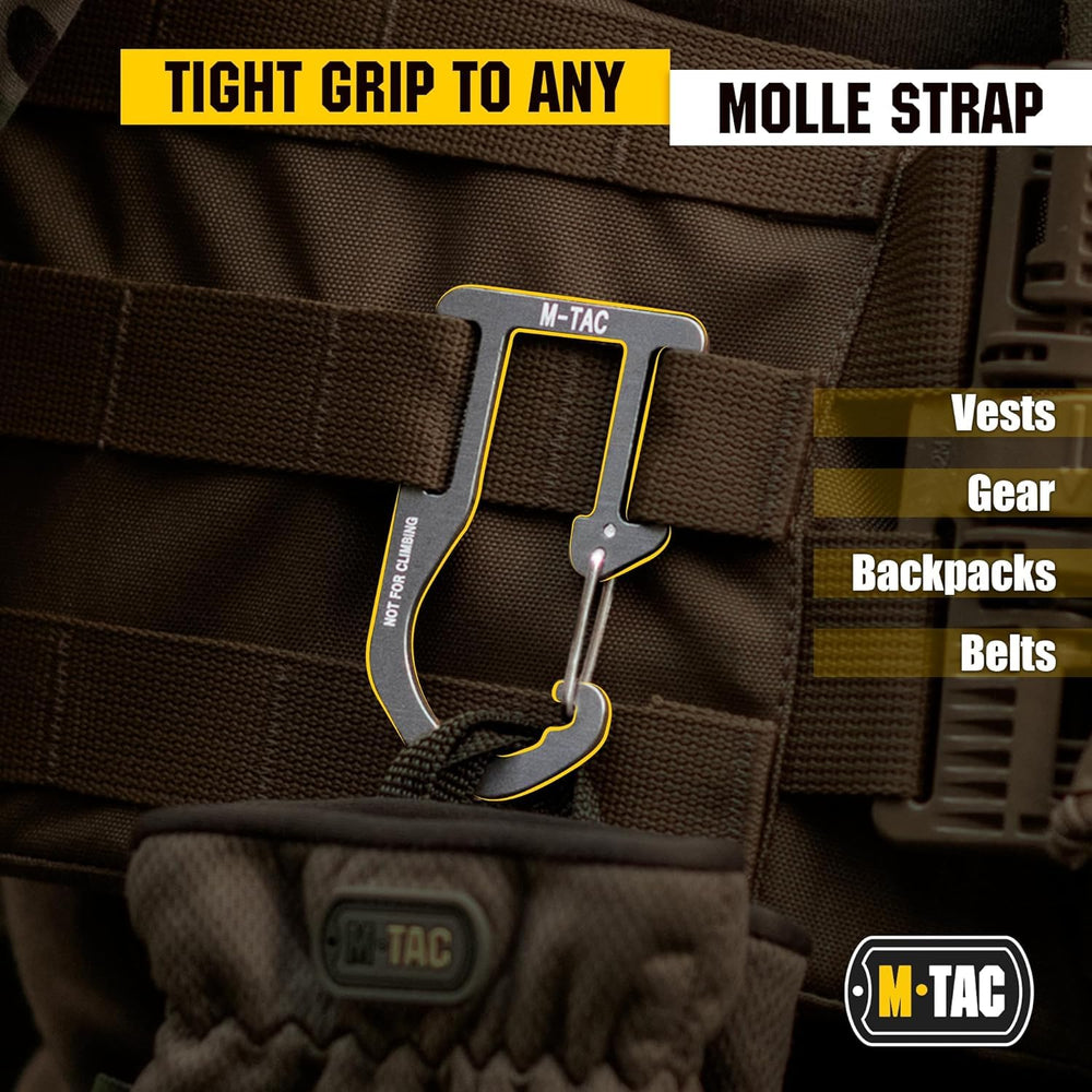 M-Tac carabiner held in hand showing size comparison and pocket-friendly benefit