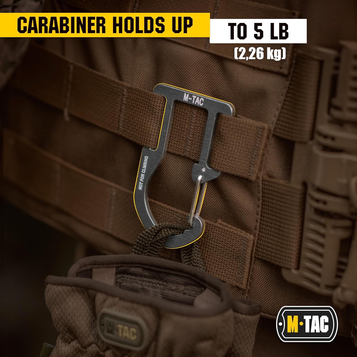 M-Tac carabiner side slot detail showing molle attachment points and secure mounting benefit