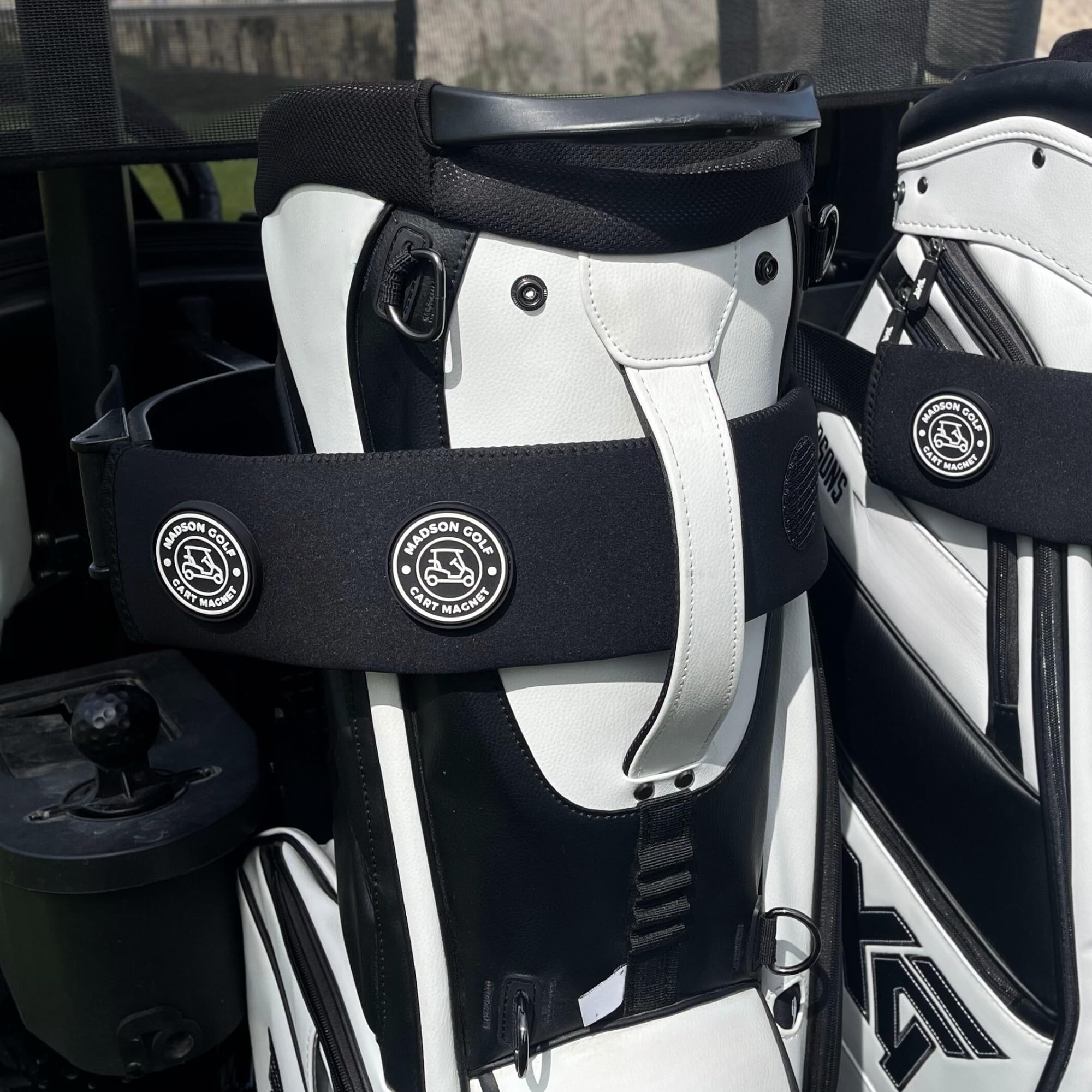 MADSON GOLF front view of white sleeve showing clean protection benefit