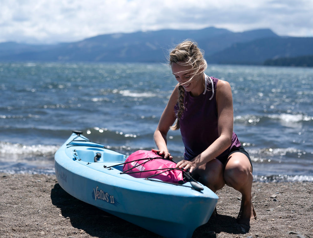 MARCHWAY on beach near camping gear showing versatile outdoor and travel use