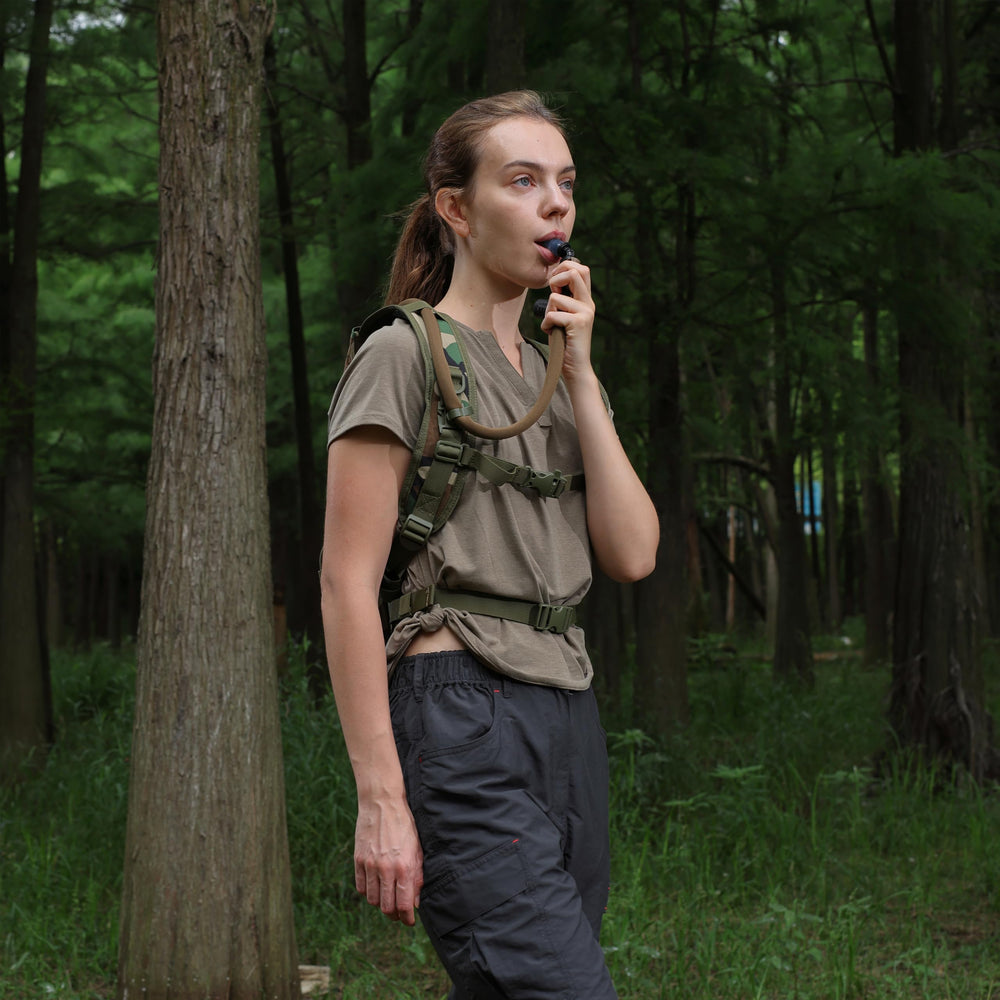MARCHWAY worn by hiker on trail demonstrating hands-free hydration benefit