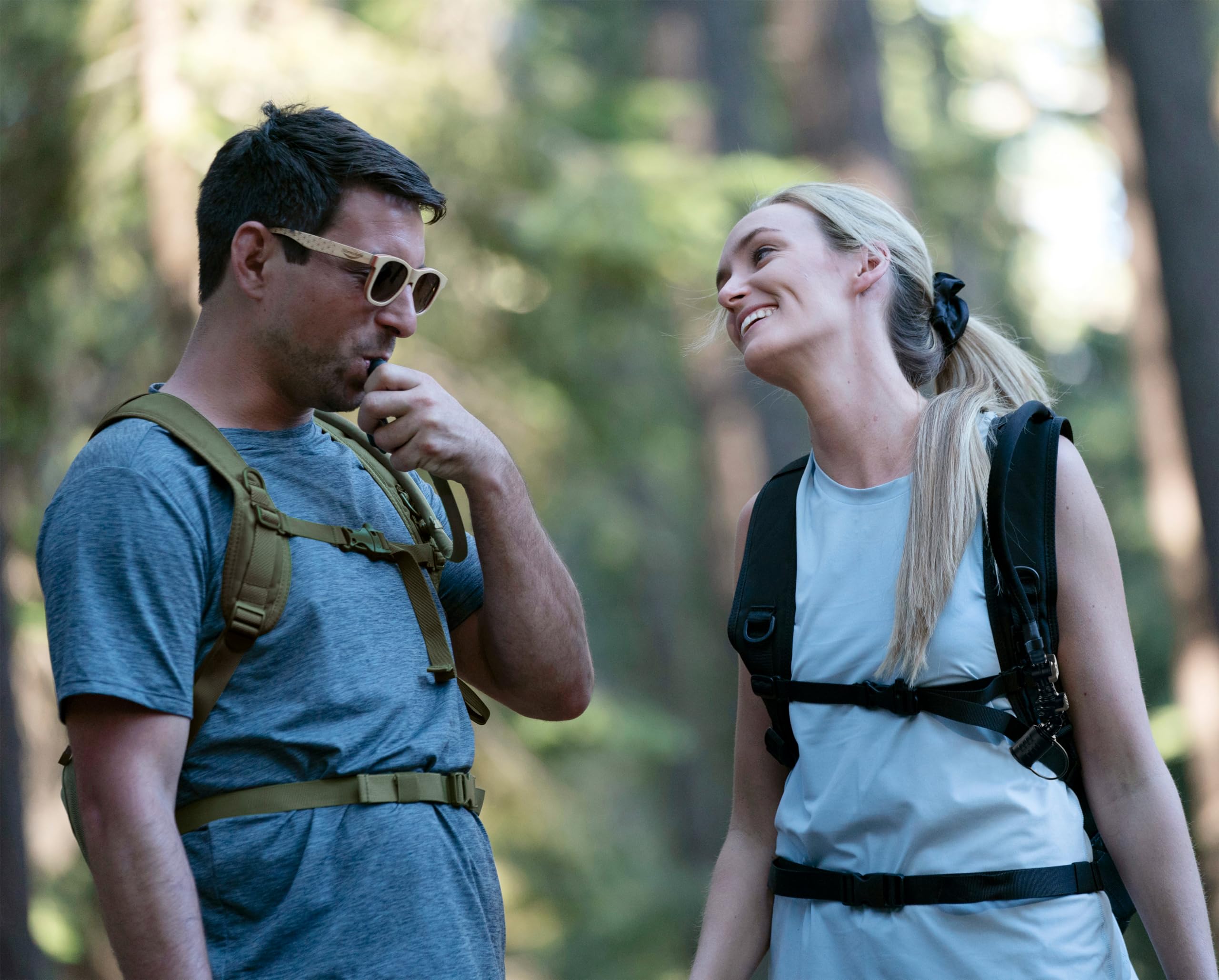 MARCHWAY hydration bladder in use on a hike showing hands-free sipping convenience