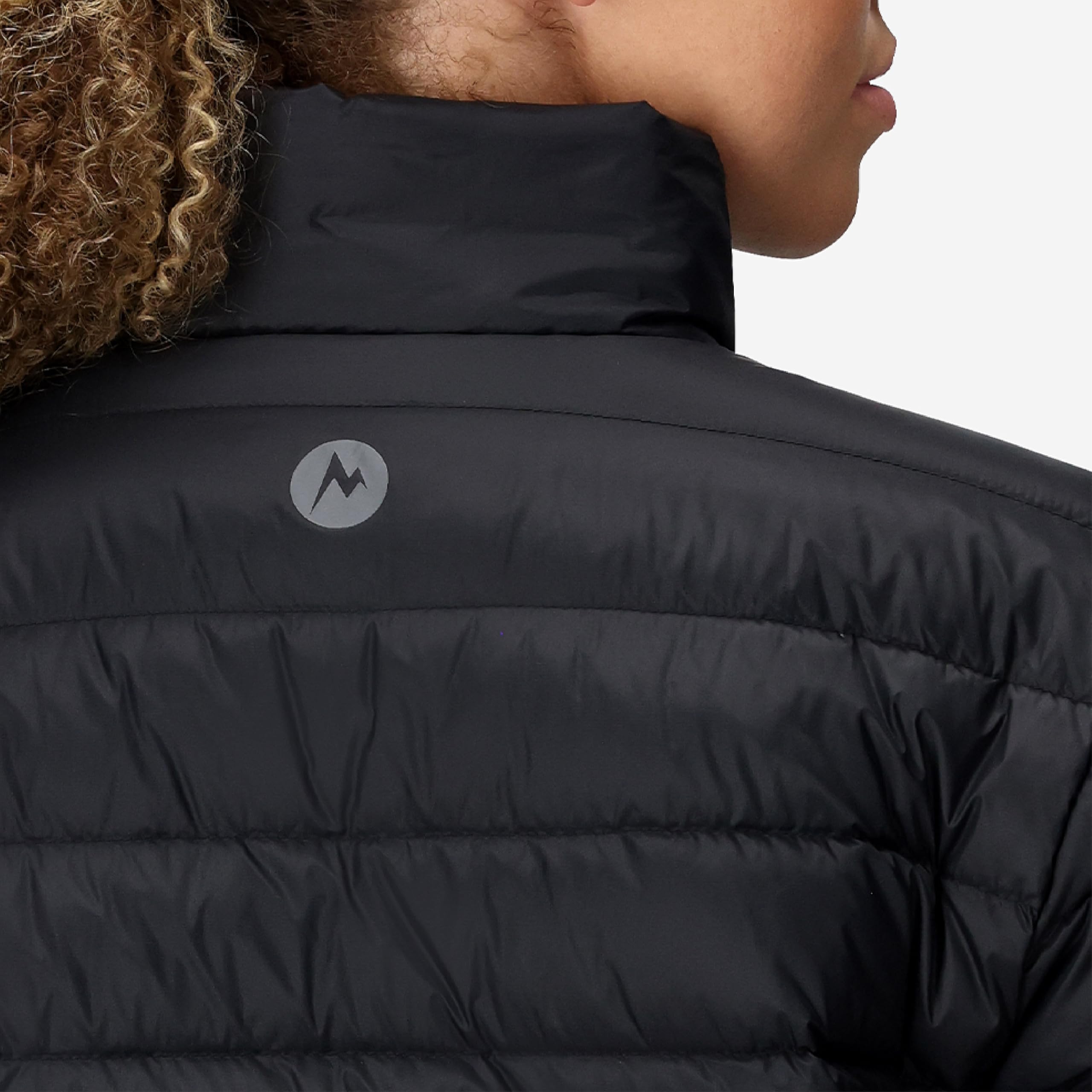 Marmot Jena packed in rucksack showing compressibility for travel