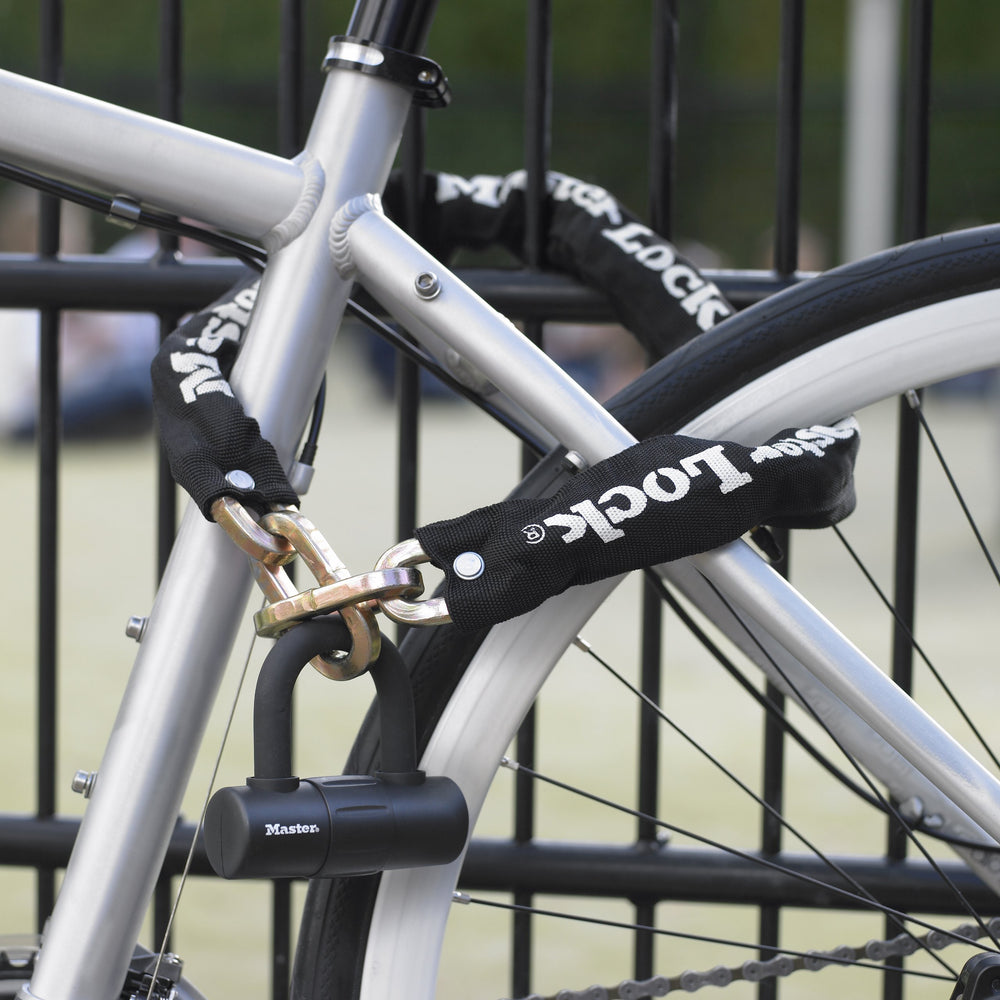 Master Lock chain secured around bicycle frame providing reliable anchoring
