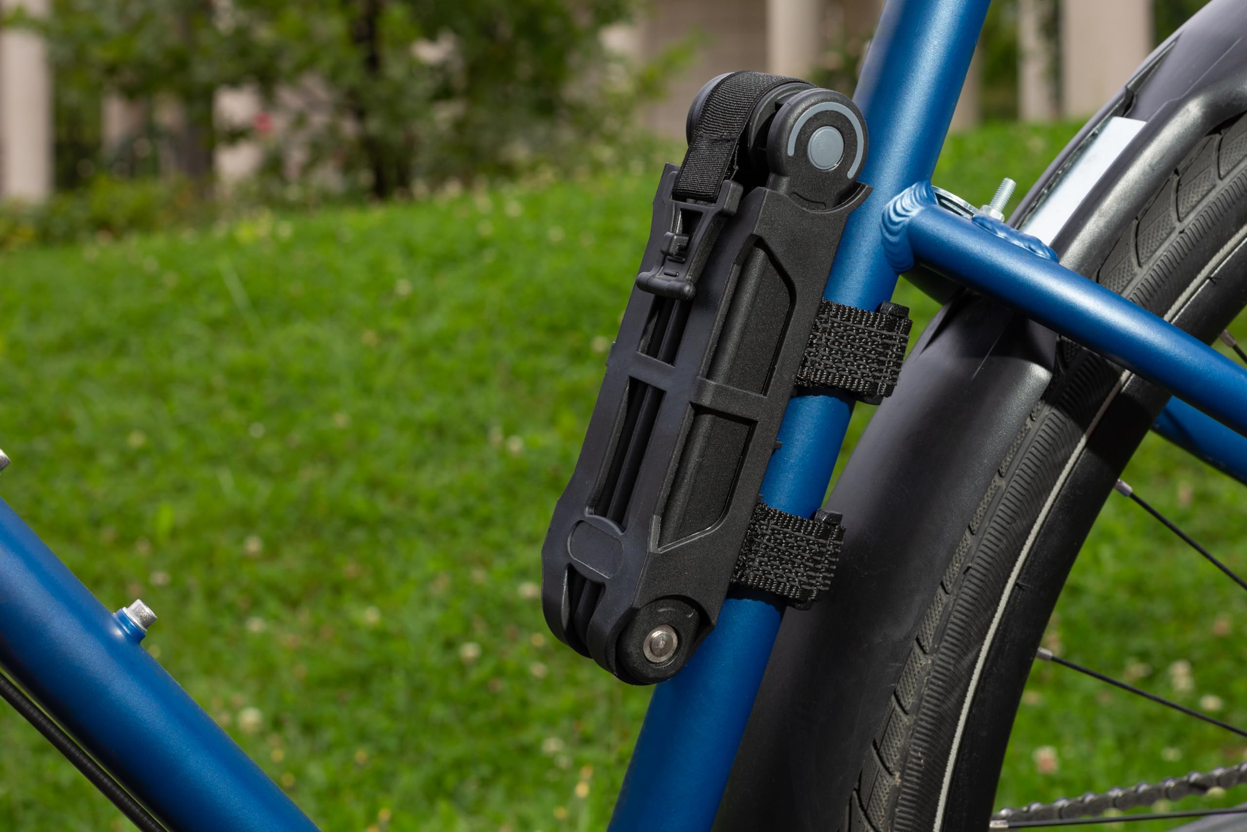 Master Lock lifestyle shot with commuter using lock for everyday security