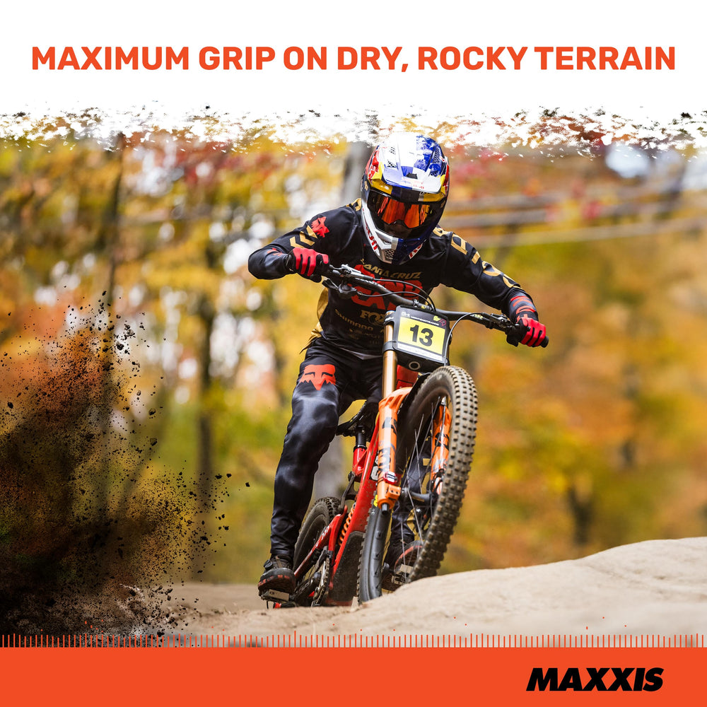 Maxxis Aggressor on trail action shot, showcases confident high-speed control