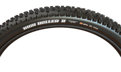 MAXXIS detail of shoulder knobs demonstrating cornering bite and stability