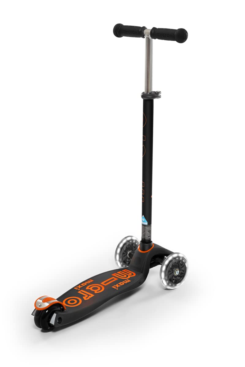 Micro Maxi LED next to child for scale demonstrating suitable age range