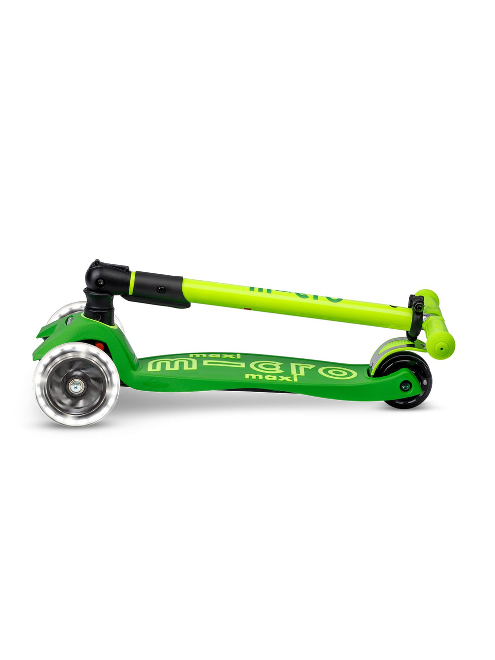 Micro scooter next to child for size comparison indicating fit for ages 5–12