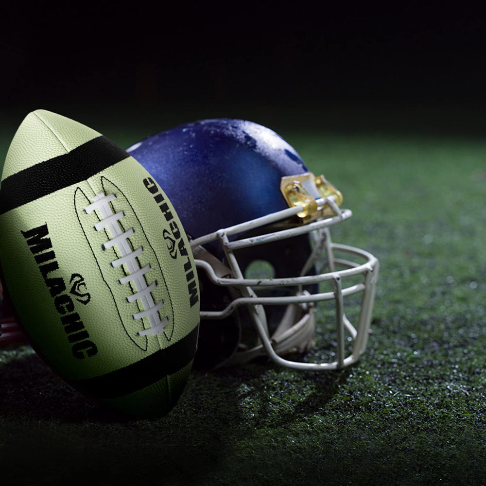 MILACHIC glowing football in night game demonstrating high visibility during play