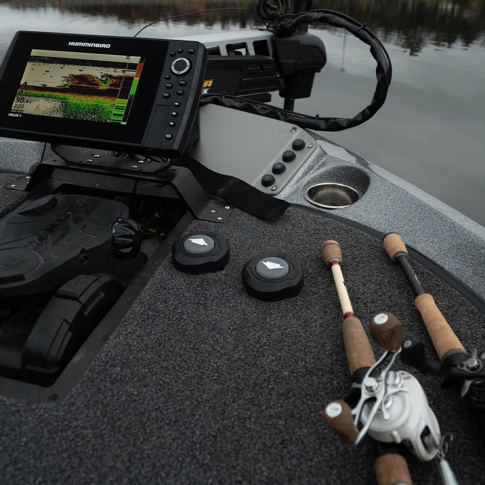 Minn Kota stomp switch lifestyle image on fishing boat enabling hands-free anchoring