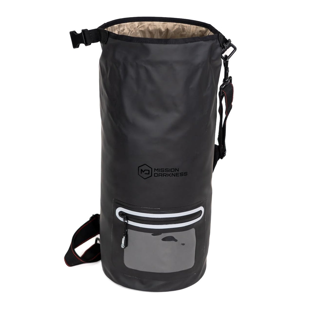 Mission Darkness tote in rain scene showing weatherproof protection benefit