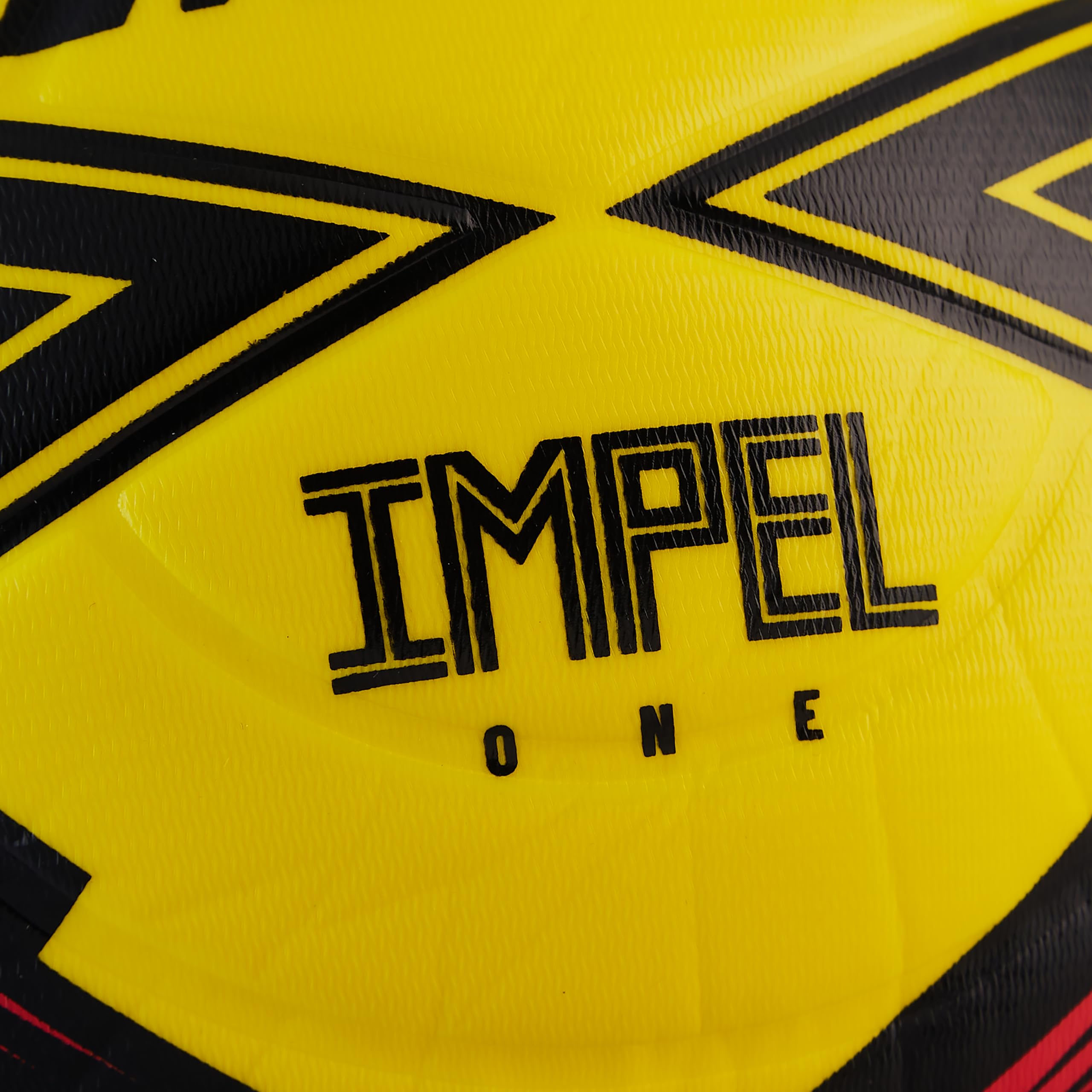 Mitre IMPEL ONE held in hand to show size and youth-friendly weight