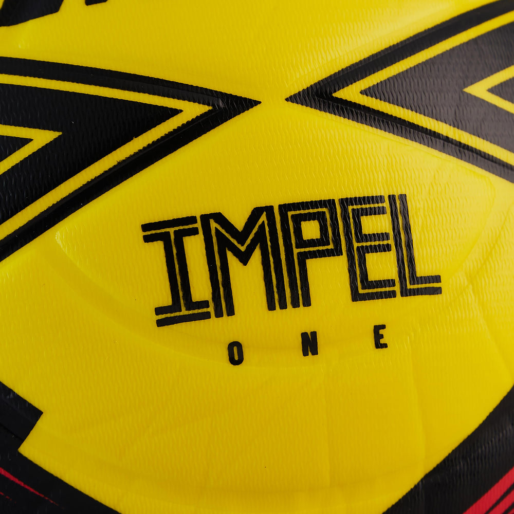 Mitre IMPEL ONE held in hand to show size and youth-friendly weight