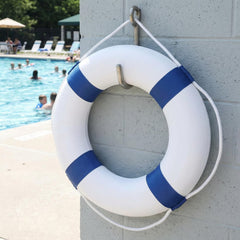 Momotata ring hanging on pool fence for fast retrieval and visible safety
