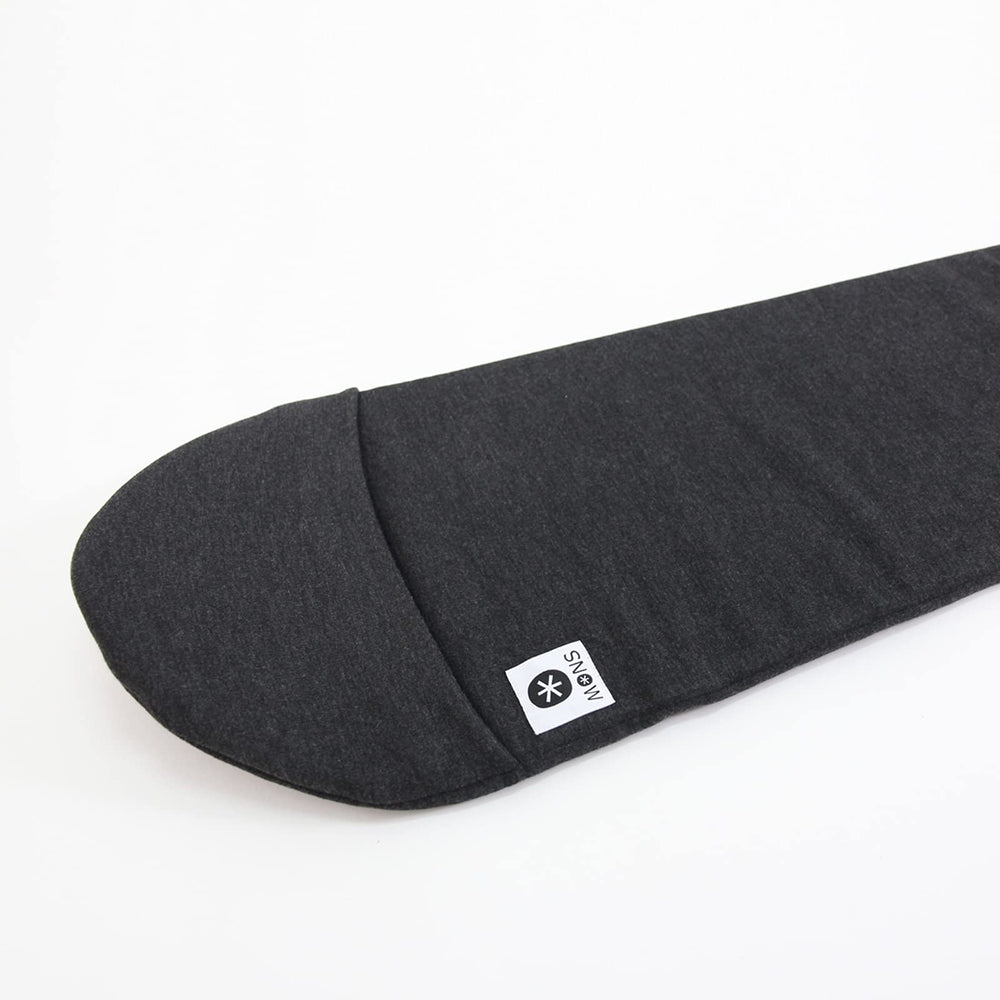 MONS sleeve inside travel bag showing space-saving benefit