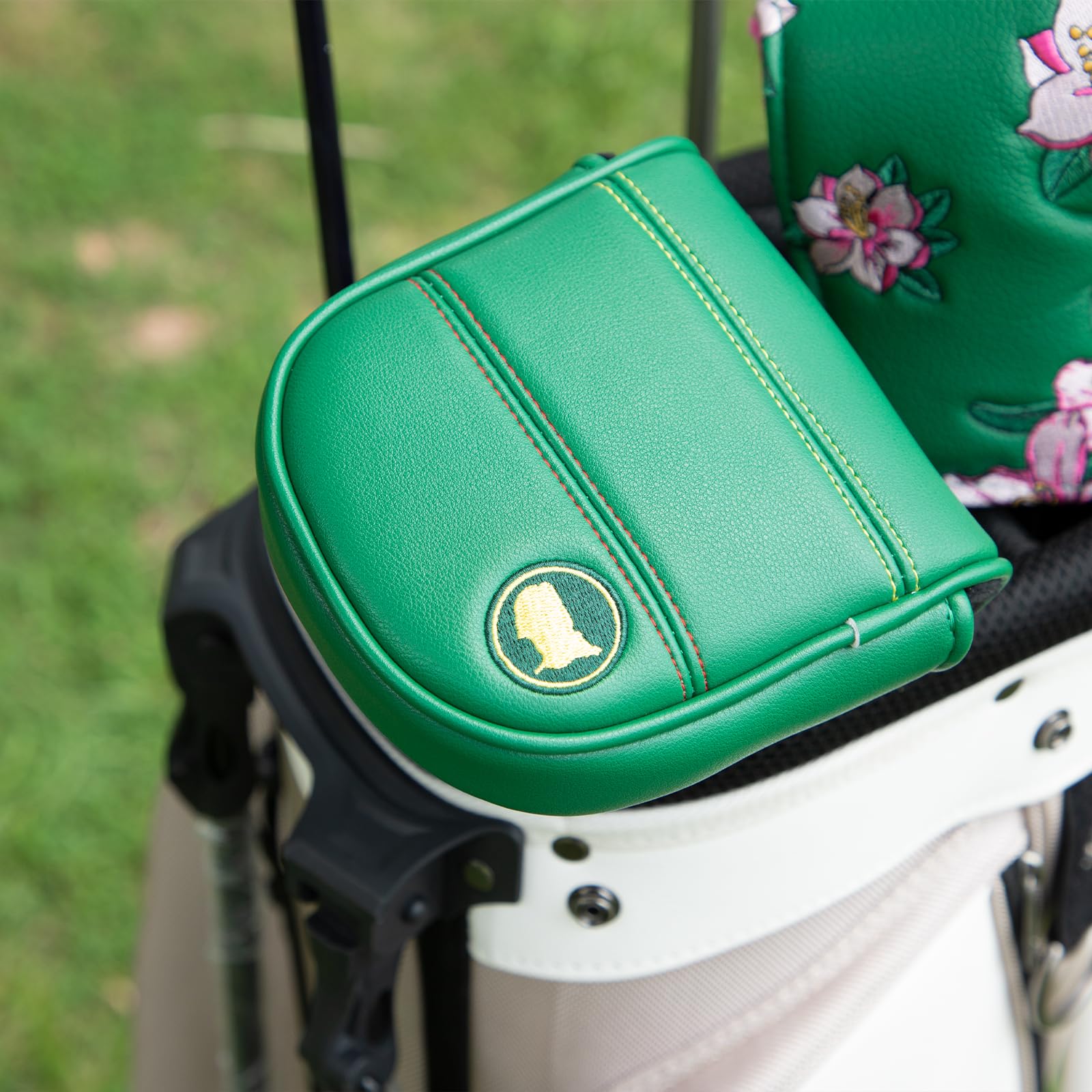 montela golf putter cover held in hand to show size and easy handling