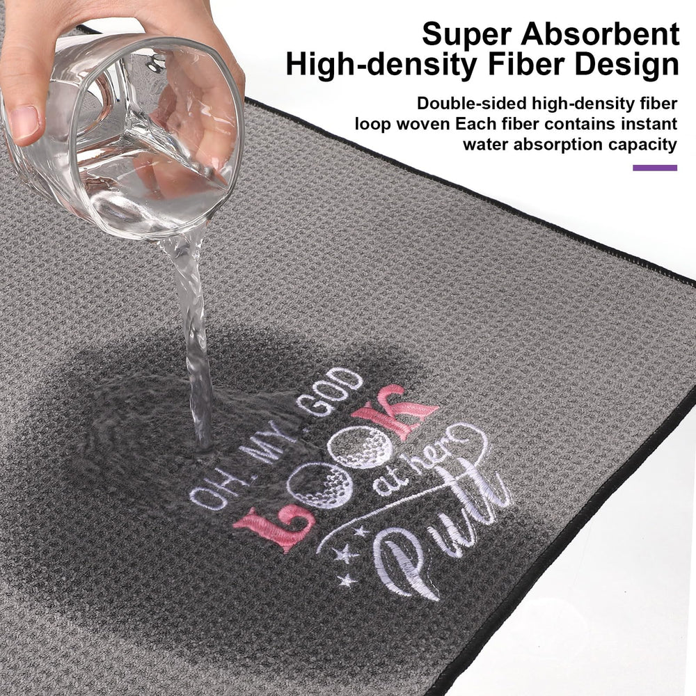 Moukeren towel held in hand showing 16x24 inch size and portability