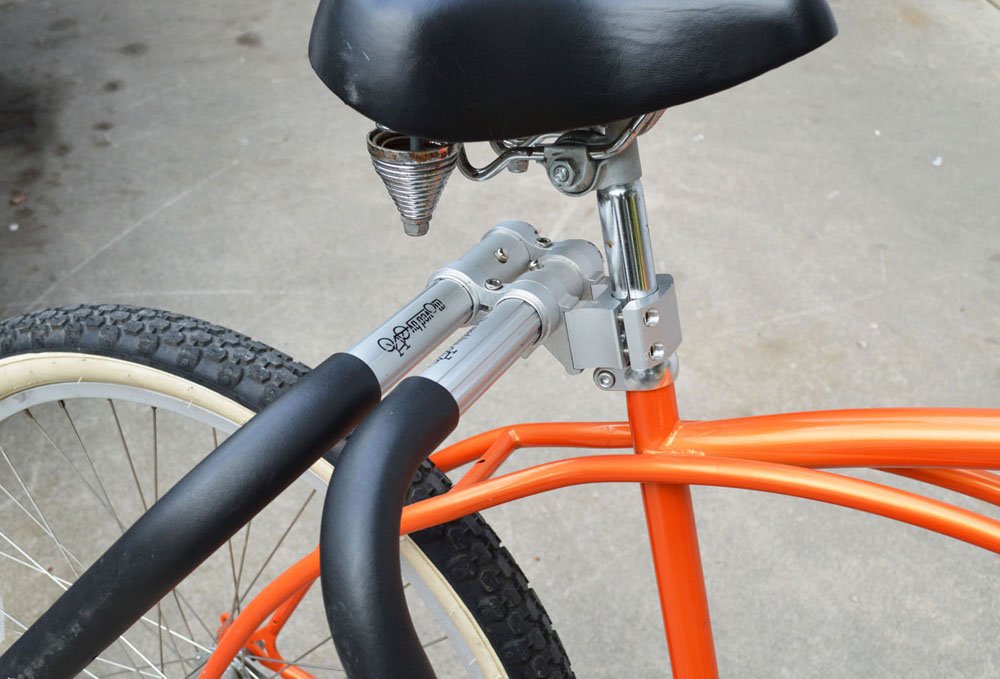 Moved By Bikes aluminum and stainless finish close-up showing corrosion-resistant build